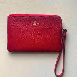 Coach brand corner zip wristlet in red